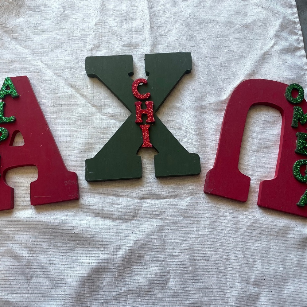 Green and red alpha chi omega letters
